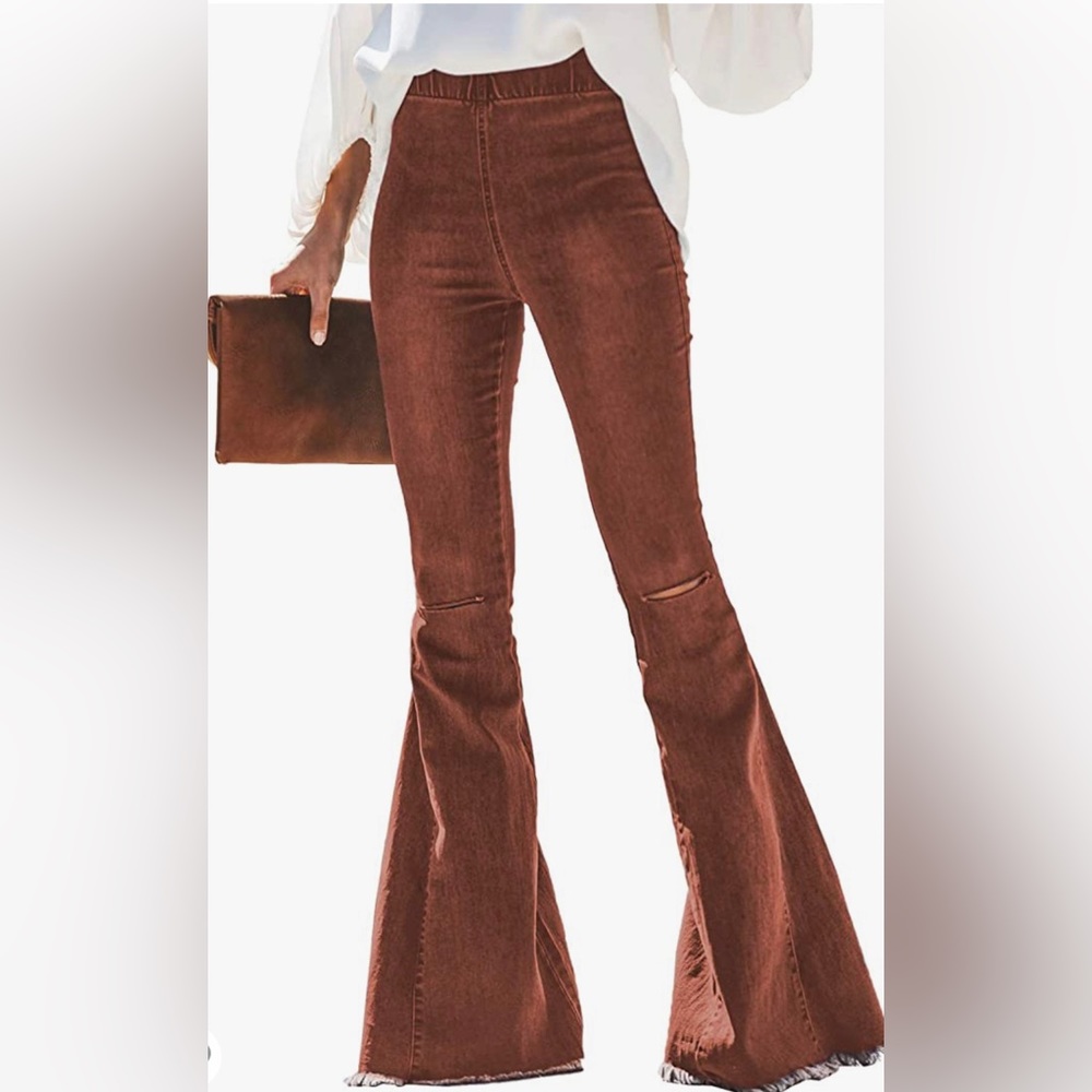 New distressed wide-leg  raw gem elastic waist jeans .